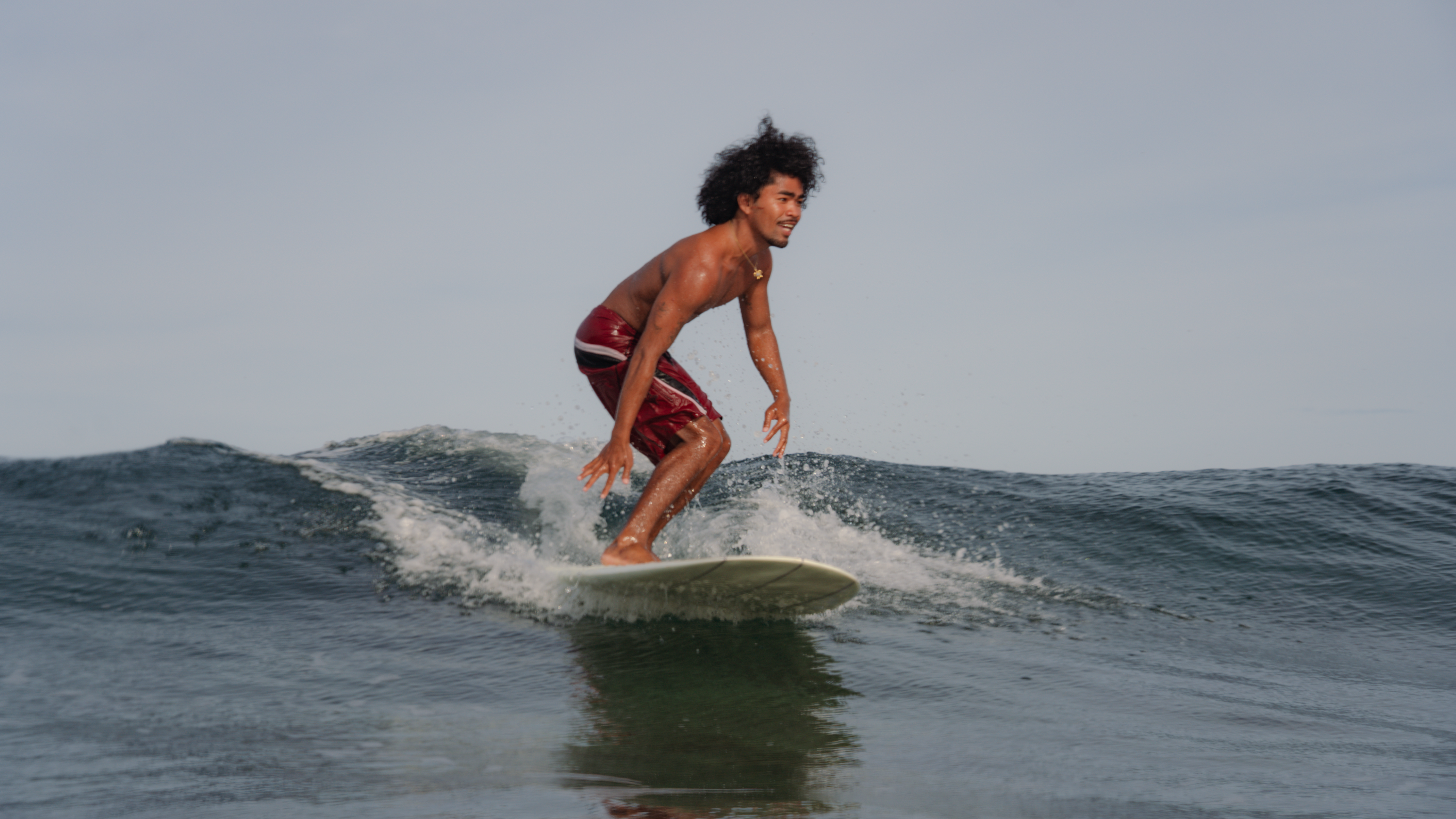 Surfer riding wave